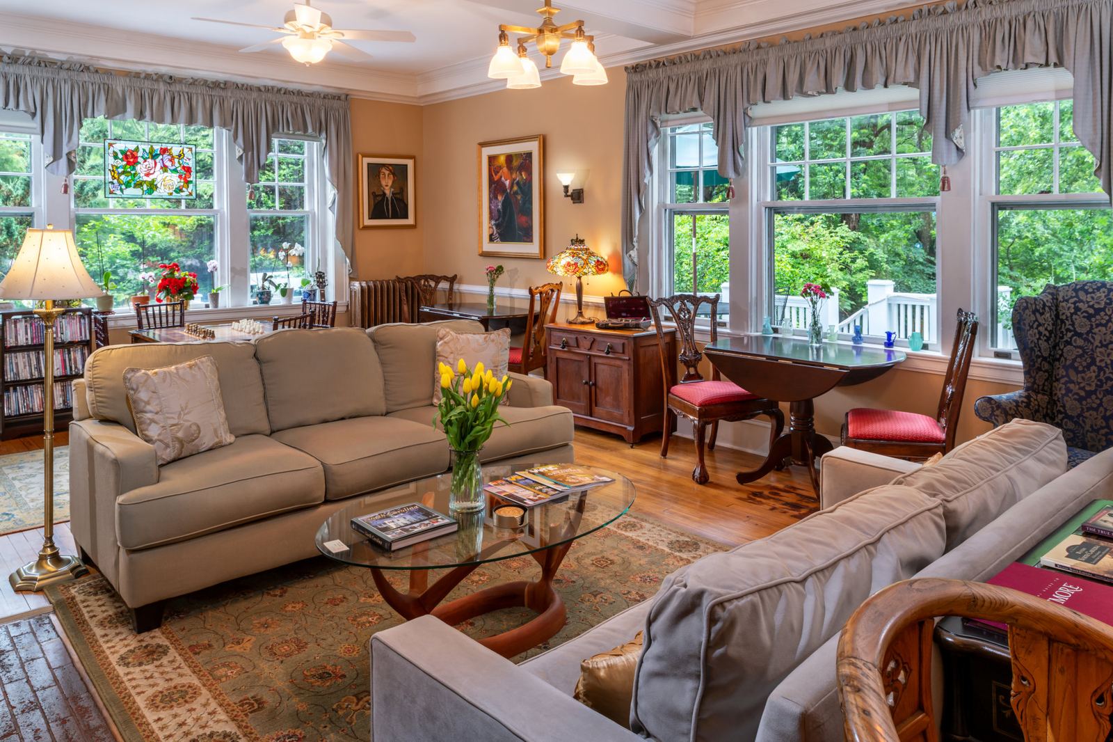 The living room at Abbington Green with comfortable seating and garden views